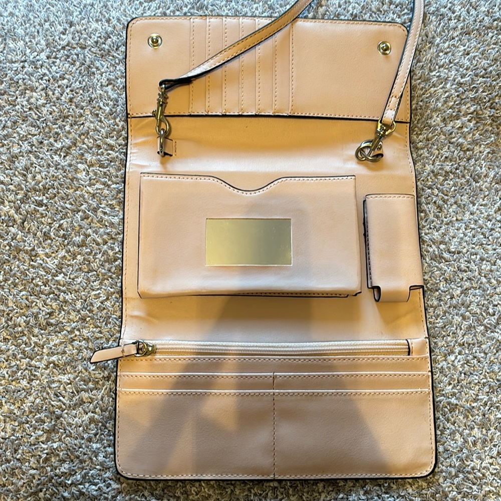 Gray clutch with lots of pockets